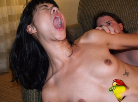 Dark haired Asian teen gets banged on a loveseat by a Caucasian boy 31958271