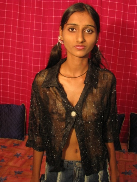 Indian girl holds her long pigtails before showing her natural tits 76203777
