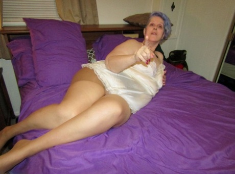Fat granny Bunny Gram works free of handcuffs before sucking cock on her bed 30702427