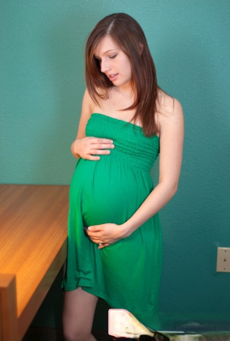 Pregnant girl removes an off shoulder dress before masturbating 46892258