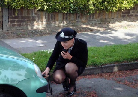 Redheaded woman indulges in lesbian foreplay with a British policewoman 58375865