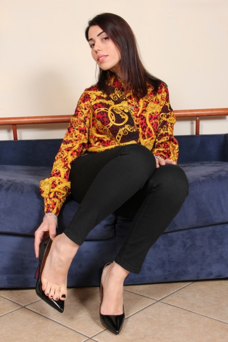 Fully clothed beauty Petra sets her pretty feet free of black heels 18104470