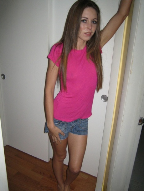 Skinny girl with long hair takes selfies while going nude 59663138
