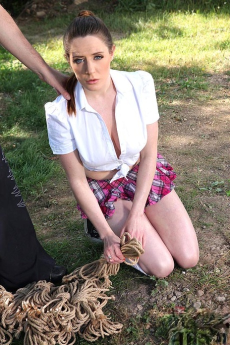 Schoolgirl Samantha Bentley finds herself suspended from ropes in the woods 97510120