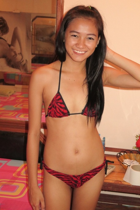 Flat chested bikini clad Asian teen Oei gets an ass bath in hot cum 98634378