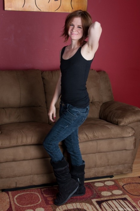 Cute redhead Zia drops her jeans and stretches wide open to show a ginger muff 41273717