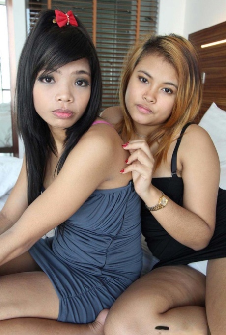 Cute young Asian girls Tik & Kam undress to pose on their knees with bare ass 57163774