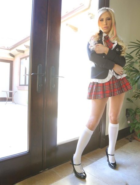 Sexy blonde Tasha Reign releases her great tits from schoolgirl clothing 77198255