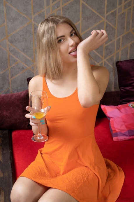 Young blonde Kata gets bare naked after enjoying homemade orange juice 14580045