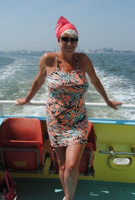 Older platinum blonde Dimonty flashes in public places on a warm day 81125296