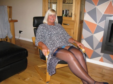 Blonde plumper Chrissy Uk gets naked on a blanket in nylons and heels 10450002