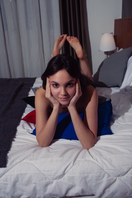 Cute brunette Lara Masier gets completely naked while in her bedroom 42330788