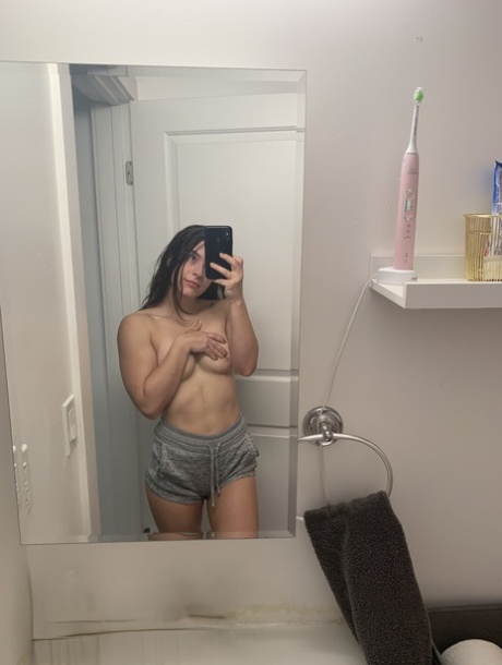 Solo model Abbie Maley takes mirror selfies while getting completely naked 57151568