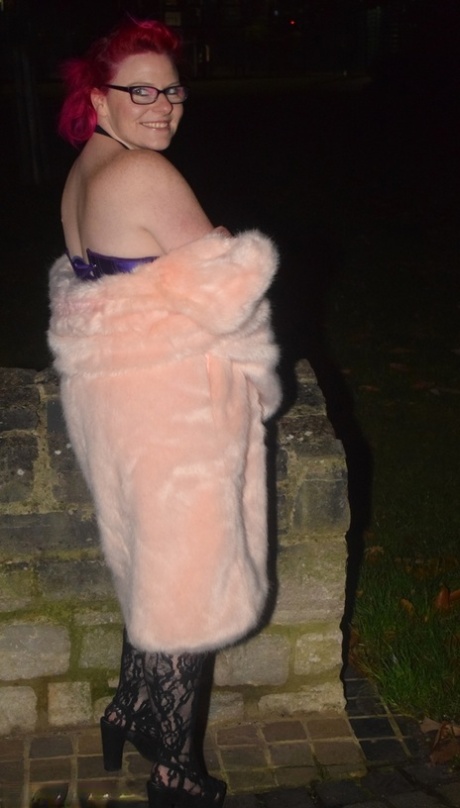 Redheaded amateur Mollie Foxxx flashes at night in a long coat