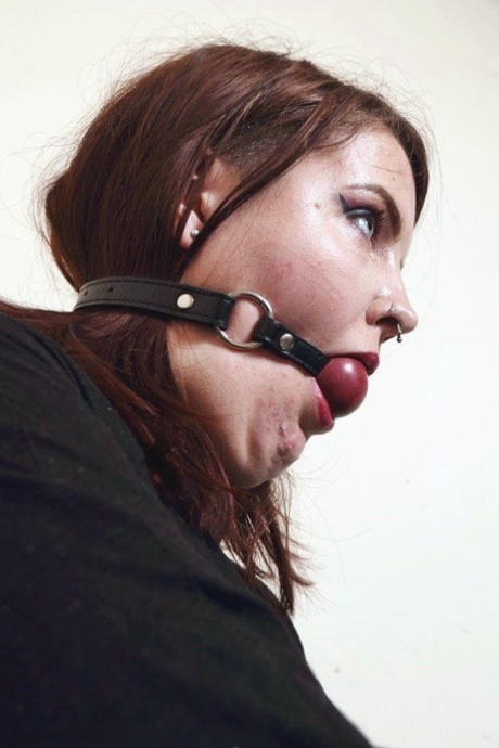 Tattooed redhead Luna La Roux sports a ball gag while restrained with straps 43397425