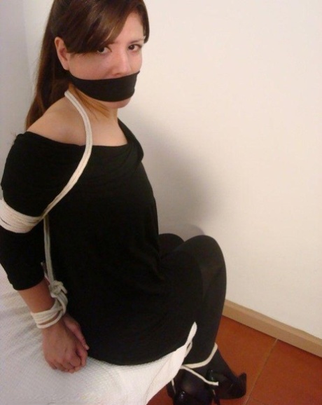 Amateur women find themselves gagged and restrained with rope in their clothes 66781816