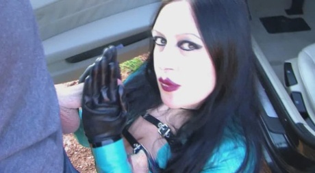Goth chick Lady Angelina sucks off a dick on a gravel road in latex clothing 22063055