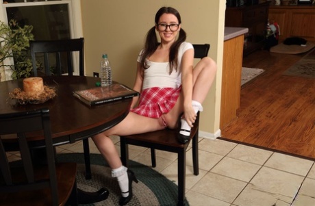 Young looking girl Charly Summer showcases her bald twat in frilly white socks 87960017