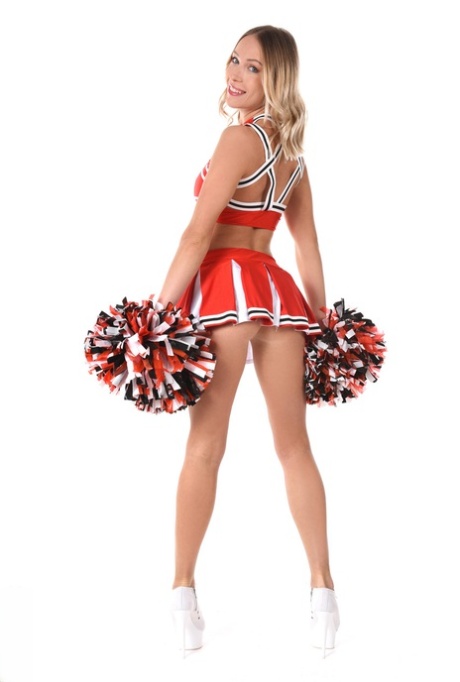 Blonde cheerleader Angelika Grays fingers her pussy after doffing her uniform 93059594