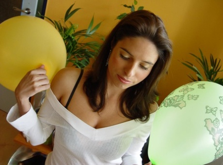 Amateur model exposes her tight slit while playing with balloons 42627661
