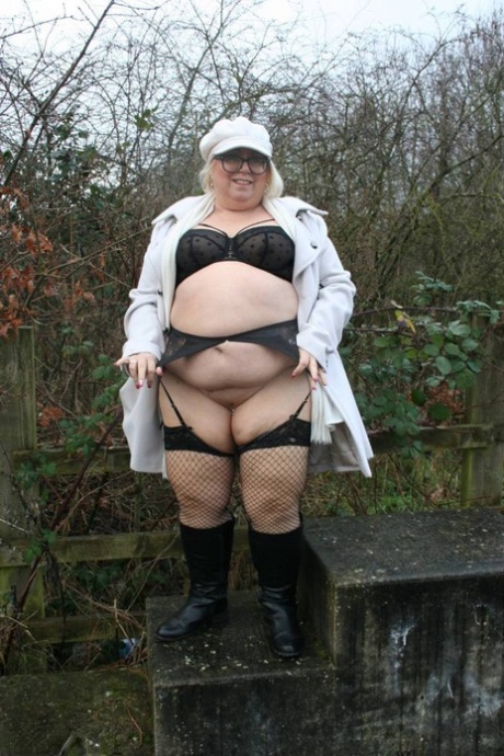 Fat British woman Lexie Cummings exposes herself on a pedestrian bridge 24207521