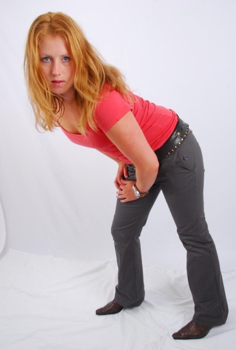 Natural redhead Judy displays her huge OOZOO cuff watch while fully clothed 18377411