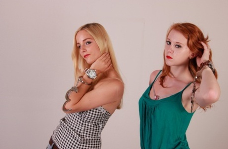 Clothed girls Eva & Amanda model Oozoo watches while handcuffed 23293040