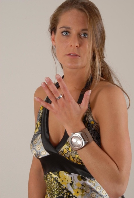 Amateur girl Sarah models a huge OOZOO cuff watch while wearing a dress 31462096
