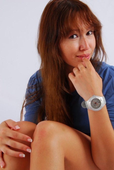 Asian model with red hair poses for a non-nude gig in a Swatch Scuba watch 48001557