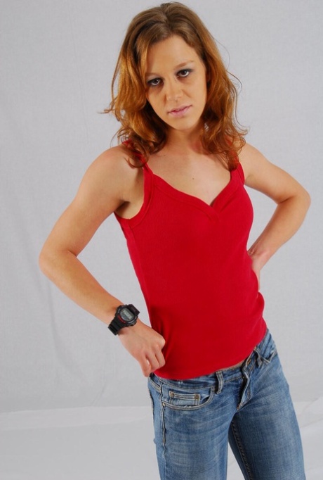 Natural redhead Sabine shows off her black G-shock watch while fully clothed 62618924