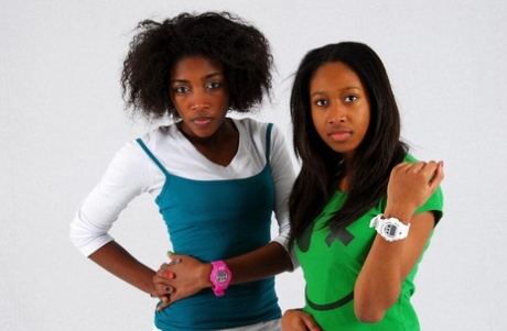 Lesbian sistas Deborah and Naomie model A Bathing Ape watches while clothed 97916714