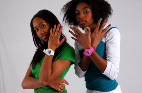 Lesbian sistas Deborah and Naomie model A Bathing Ape watches while clothed 97916714