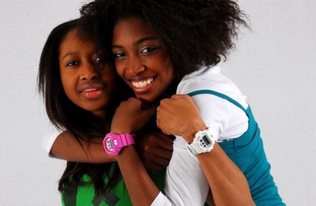 Lesbian sistas Deborah and Naomie model A Bathing Ape watches while clothed 97916714