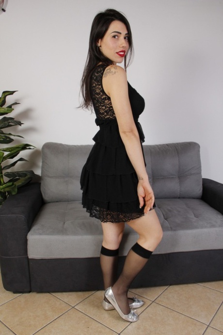 Brunette beauty Petra spreads her toes after removing nylon socks and flats 70359790