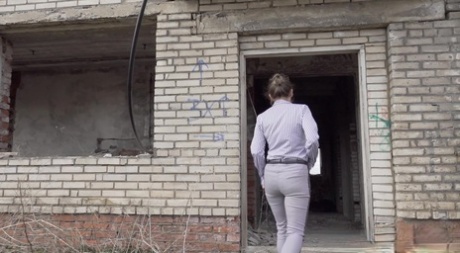 Brunette squats by abandoned building to piss 23172726