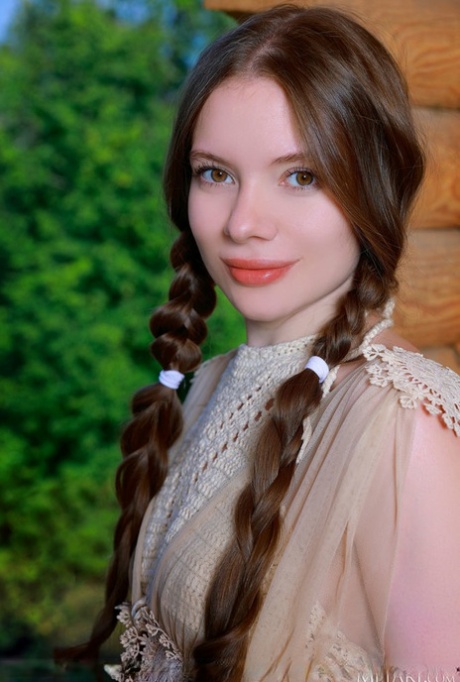 Young beauty Dariana gets naked with her long hair in braided pigtails 18677201