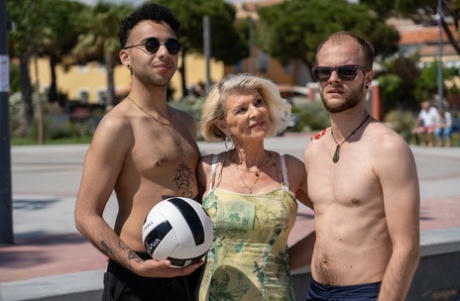 Blonde granny Eva Delage picks up a couple of boys for a bout of MMF sex 93499546