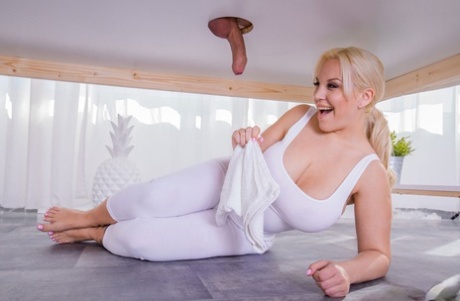 Curvy blonde masseuse Blondie Fesser drains a cock under a milking table 74540313