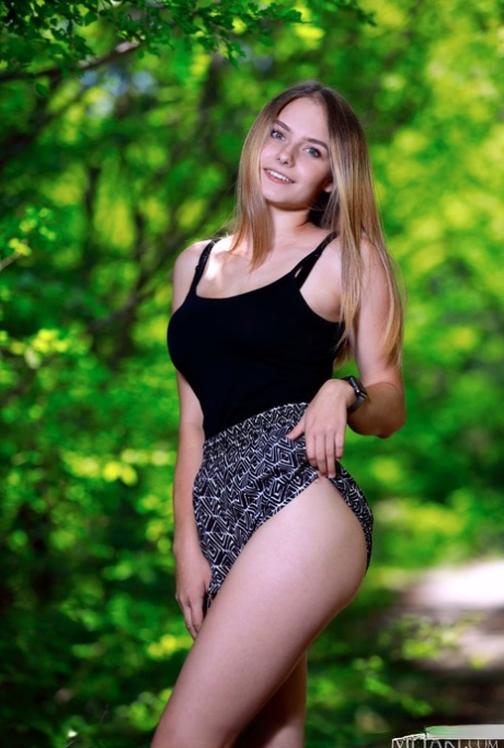 Young beauty Dakota Pink unveils her great body on a pathway through the woods 51304376