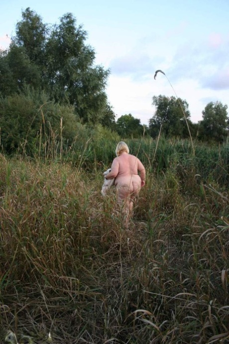 Obese British woman Lexie Cummings gets naked while out in the country 55887839