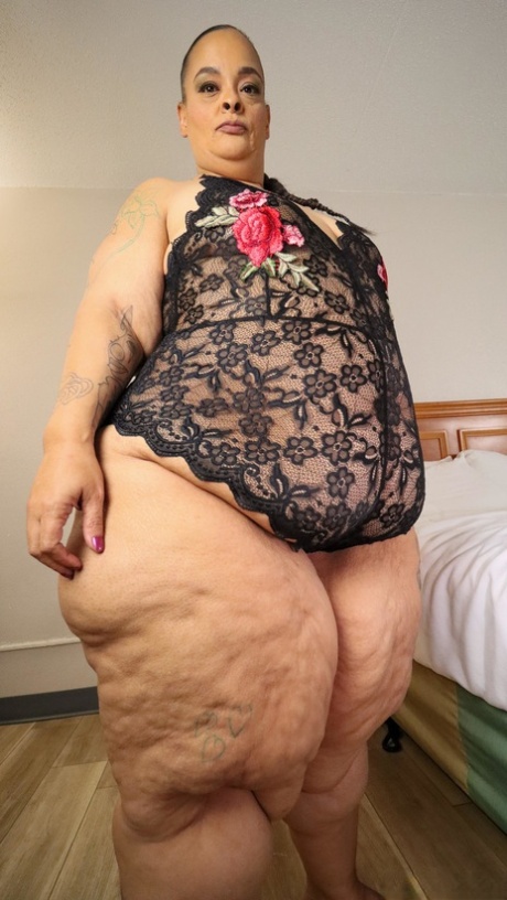 SSBBW Strawberrys Delight shows her massive ass in black lingerie 54964799