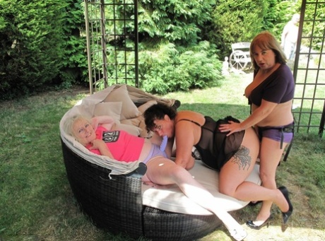 Older amateurs have a lesbian threesome on backyard furniture 25424842