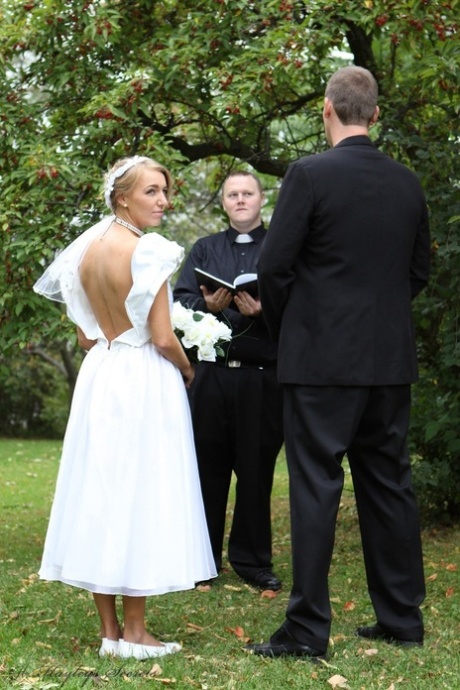 Blonde bride Hayley Marie Coppin gets naked on a lawn while taking her vows 24711926