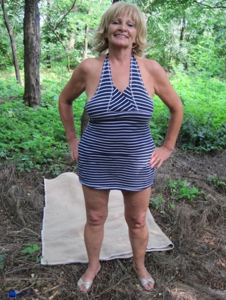 Mature blonde lady Sally G has POV sex on a blanket in the woods 25650556