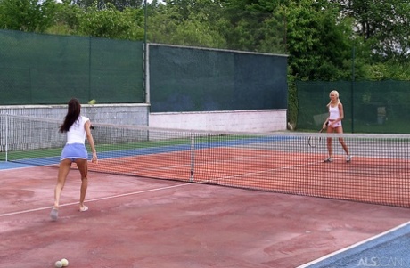 Lesbian girls have sex on a tennis court after stripping during a match 32060913