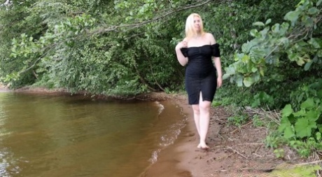 Blonde girl Magnolia stands in the water while taking a piss 56432247