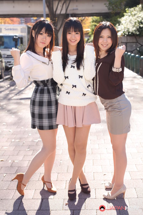 Three Japanese girls in skirts pose outdoors for a SFW shoot 77082252