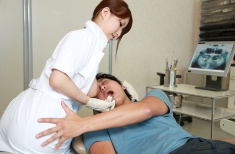 Japanese dental assistant Yume Mizuki frees her big boobs while cleaning teeth 67850168