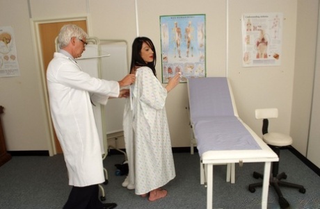 Two women force a female patient to help them jerk a doctor during CFNM action 29222647