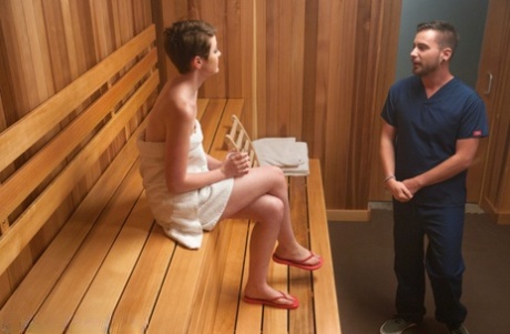 Caucasian girl with short hair is removed from a sauna before BDSM sex 93715098
